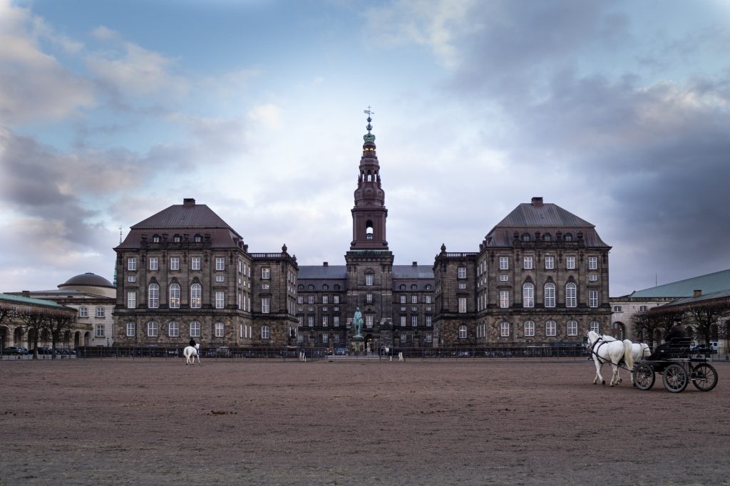 Christiansborg Palace Stables horsese-excersise on theoutdoor arena